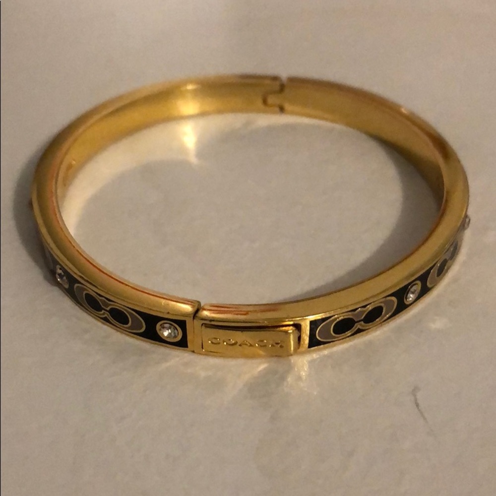 Coach “Kissing C” Bangle